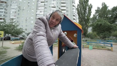 Grandma looks out to the sides. Stock Footage