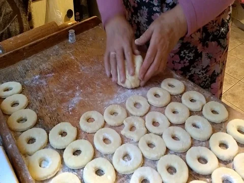 Grandma preparing oponki with curd cheese Stock Footage 81144913