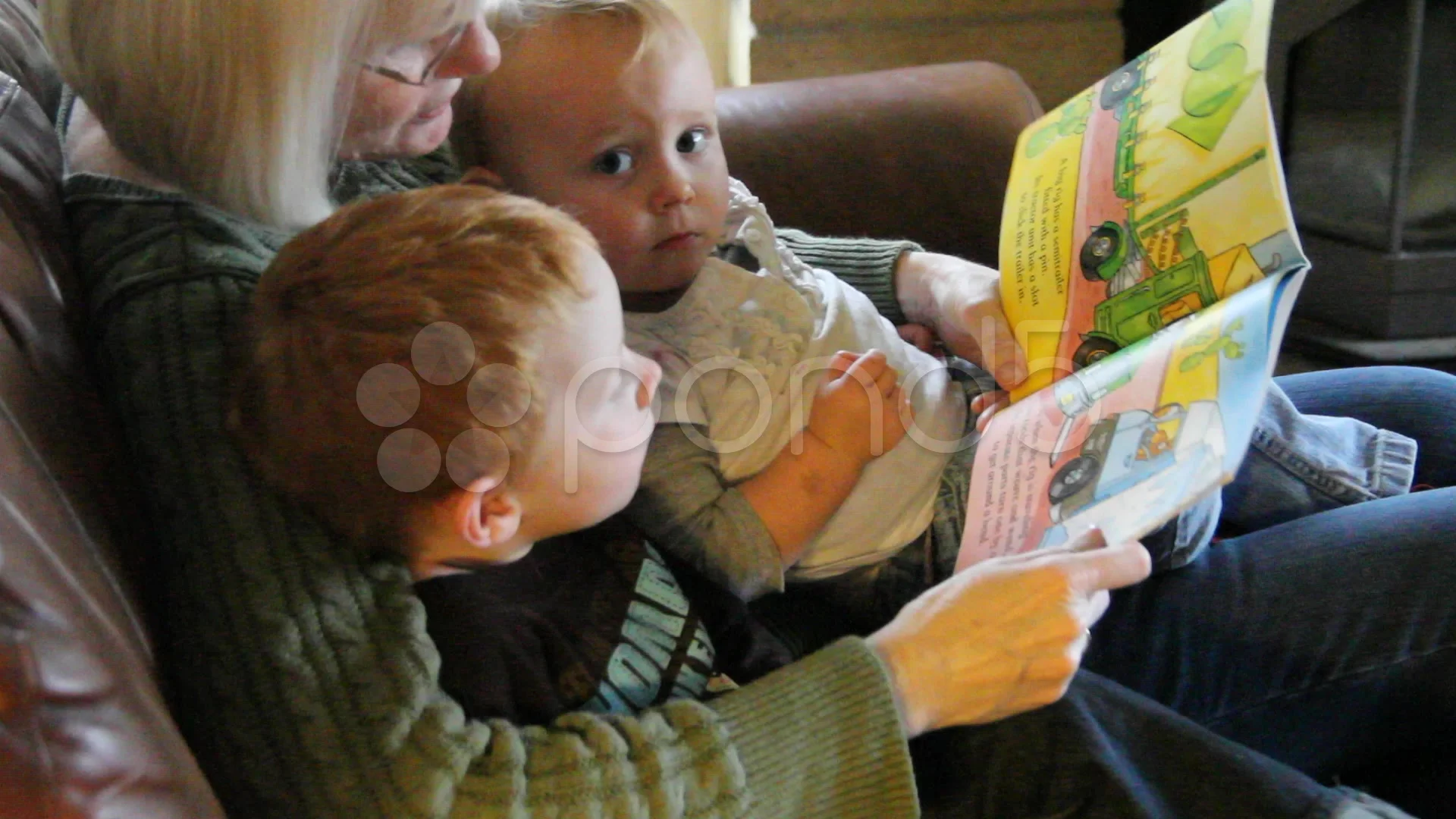 Grandma reads book to hot sale baby