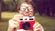 Grandma With Retro Camera Stock Footage