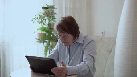 Grandma with a tablet. Stock Footage 167590979