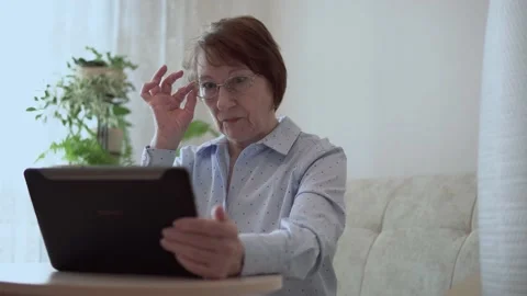 Grandma with a tablet. Stock Footage 167591003