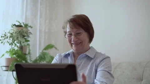 Grandma with a tablet. Stock Footage 167591007