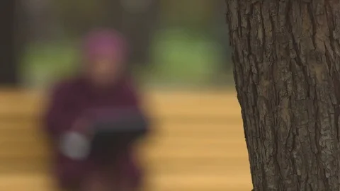 Grandma is typing on a laptop. Video stock 69896064