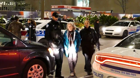 Grandma under arrest Stock Footage 120063734