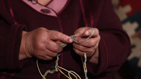 Grandma works with branches 1 Stock Footage 325852896