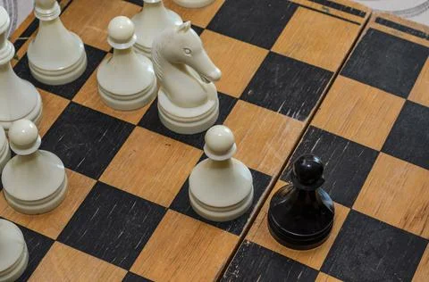 Grandmaster playing chess on a chessboard	 Stock Photos