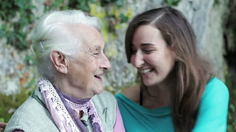 Grandmother and granddougher speaking Stock Footage