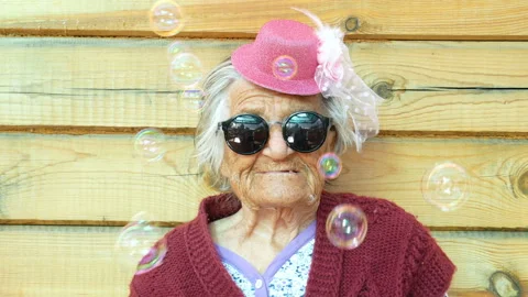 Grandmother with bubbles. Stock Footage 122372417