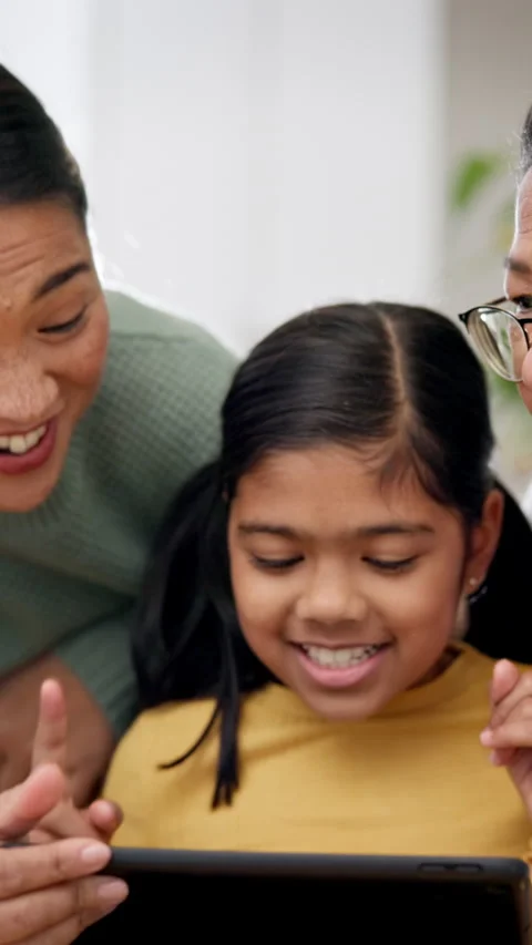 Grandmother, kid and learning with tablet in home, storytelling and play game Stock Footage 336844277