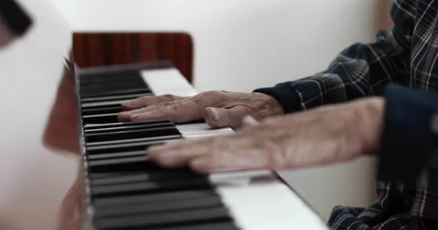 Grandmother playing piano. Stock Footage 143965853