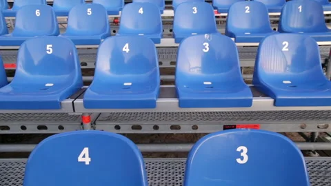 Grandstand seats - numbered temporary retractable seating. Modular stands Stock Footage 167645090
