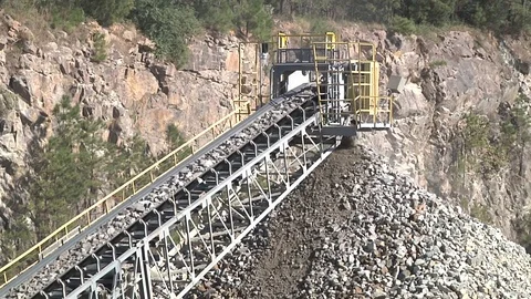 Granite aggregate pile with conveyor Stock Footage 97959270