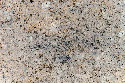 Granite background. The wall of the old building. Close-up. Foto stock