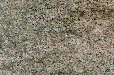Granite background. The wall of the old building. Close-up. 库存照片