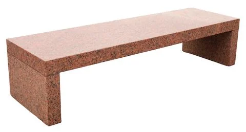 A granite bench sits alone on a white background. This bench can be used in.. Stock Photos