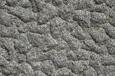 Granite block bumpy surface Granite block bumpy surface closeup as backgro... Stock Photos