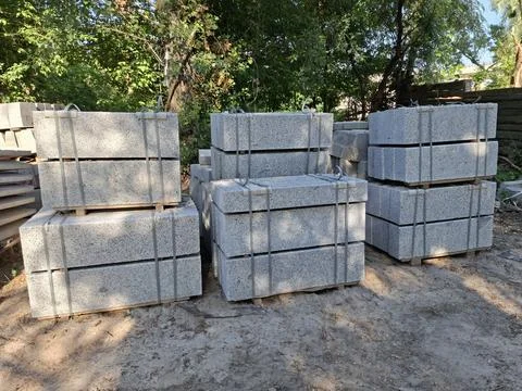 Granite blocks at construction site Foto stock