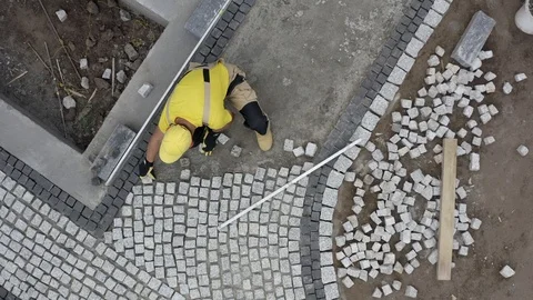 Granite Brick Paving Worker. Contractor Building Residential Garden Path. Stock Footage 119033512