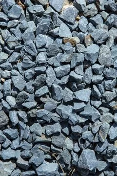 Granite chippings layer texture for road asphalting preparation, close up Stock Photos