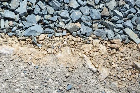 Granite chippings layer texture for road asphalting preparation, close up Stock Photos