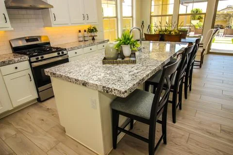 Granite Counters In Modern Kitchen With Decorator Items Stock Photos