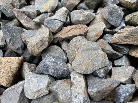 Granite crushed stone from solid rock of granular structure Stock Photos