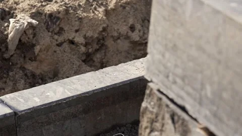Granite curb was installed on the edge of a city road during renovation Stock-Footage 331985330