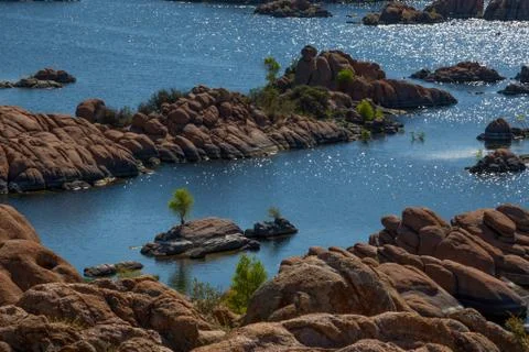 Granite Dells, Rock Islands, Blue Lake, Sun Reflected on the Water Stock Photos