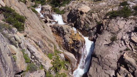 Granite Divided by a Waterfall Stock Footage 251343048