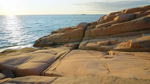 Granite flat smooth solid bedrock and round walls on west coast in Sweden Stock Footage 163243276