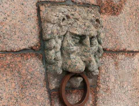 Granite lion's head with an iron ring Stock Footage 151766495