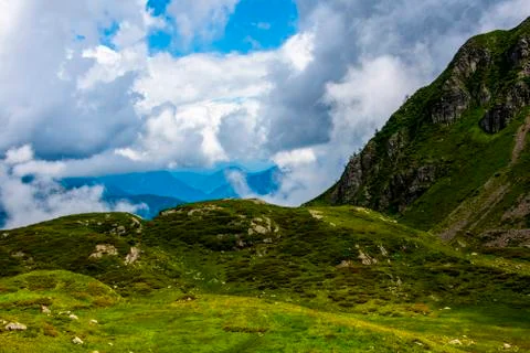 Granite mountains and clouds five Stock Photos