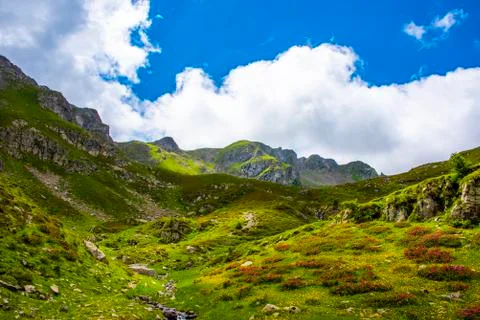 Granite mountains and clouds four Stock Photos