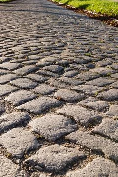 Granite paved road Stock Photos