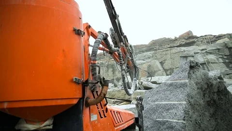Granite quarry drilling Stock Footage