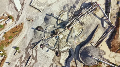 Granite quarry with machinery and activity in operation at a mining site during Stock Footage 340937531
