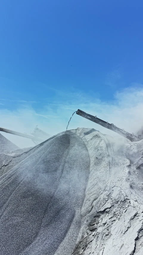 Granite quarry in operation with machinery processing stone and moving materials Stock Footage 337911821