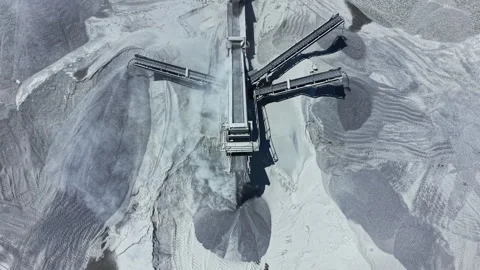 Granite quarry operations take place at a mining site with heavy machinery Stock Footage 337899211