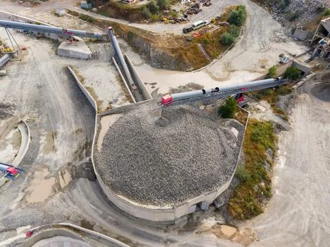 Granite quarry processes rocks and materials at large facility Stock Photos