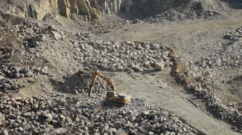 Granite quarry. Work inside the pit on the excavator. Dusty work in career. Stock Footage 48502840