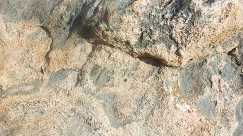 Granite rock. Boulder, rock face. Raw, authentic granite mineral rock, animation Видео 337115756