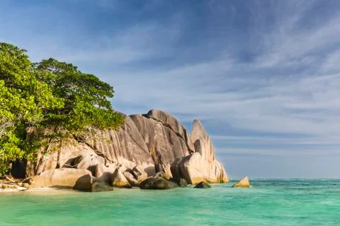 Granite rocks at Anse Source D'Argent in La Digue, Seychelles with warm eveni Stock Photos