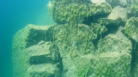 Granite rocks under water Stock Footage 62190844