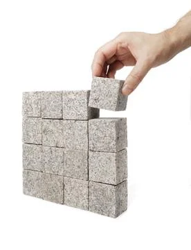 Granite Square Man making a square shape of blocks made of granite rock. C... Stock Photos