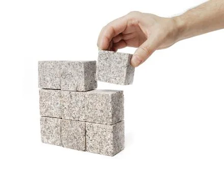 Granite Square Man making a square shape of blocks made of granite rock. C... Stock Photos