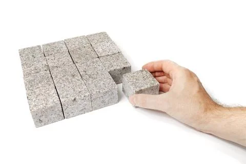 Granite Square Man making a square shape of blocks made of granite rock. C... Stock Photos