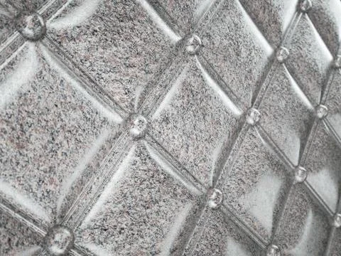 Granite stitched texture or background with bumps Illustrazione stock
