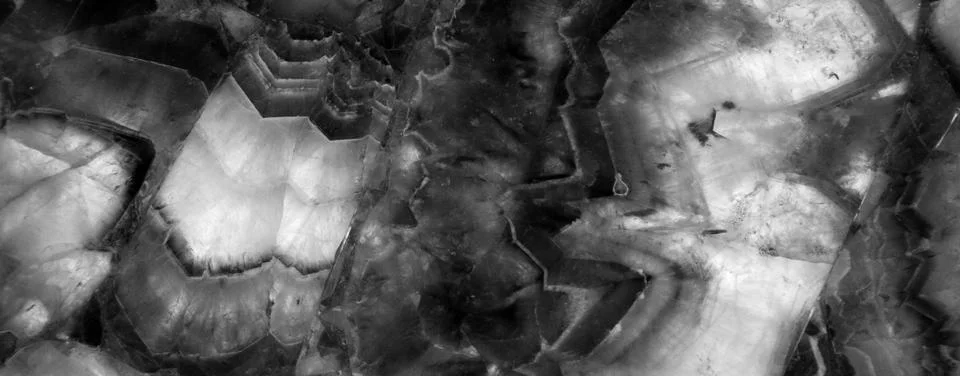Granite stone pattern useful as background or texture, natural black white gray Stock Photos