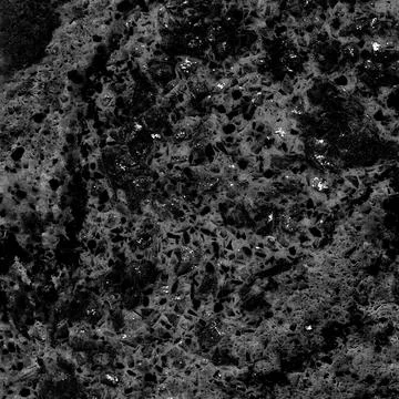 Granite stone pattern useful as background or texture, natural black white gray Stock Photos